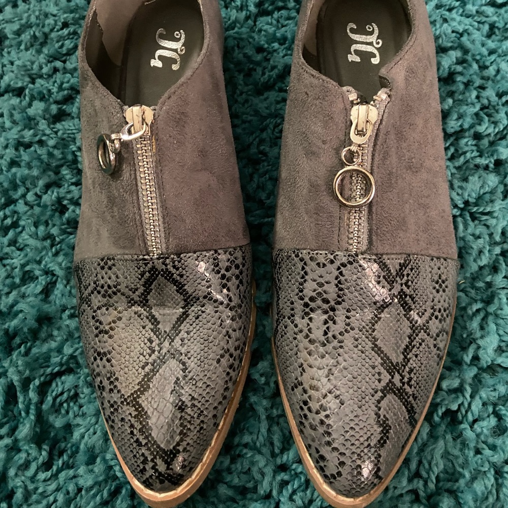 Snakeskin tipped flats